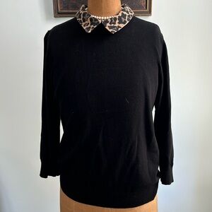 Black sweater with animal print collar